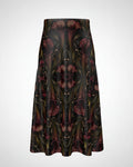 A high-waisted A-line midi skirt featuring a dark, symmetrical Art Deco style botanical pattern with burgundy, gold, and olive green details on a black base, shown against a plain white background.