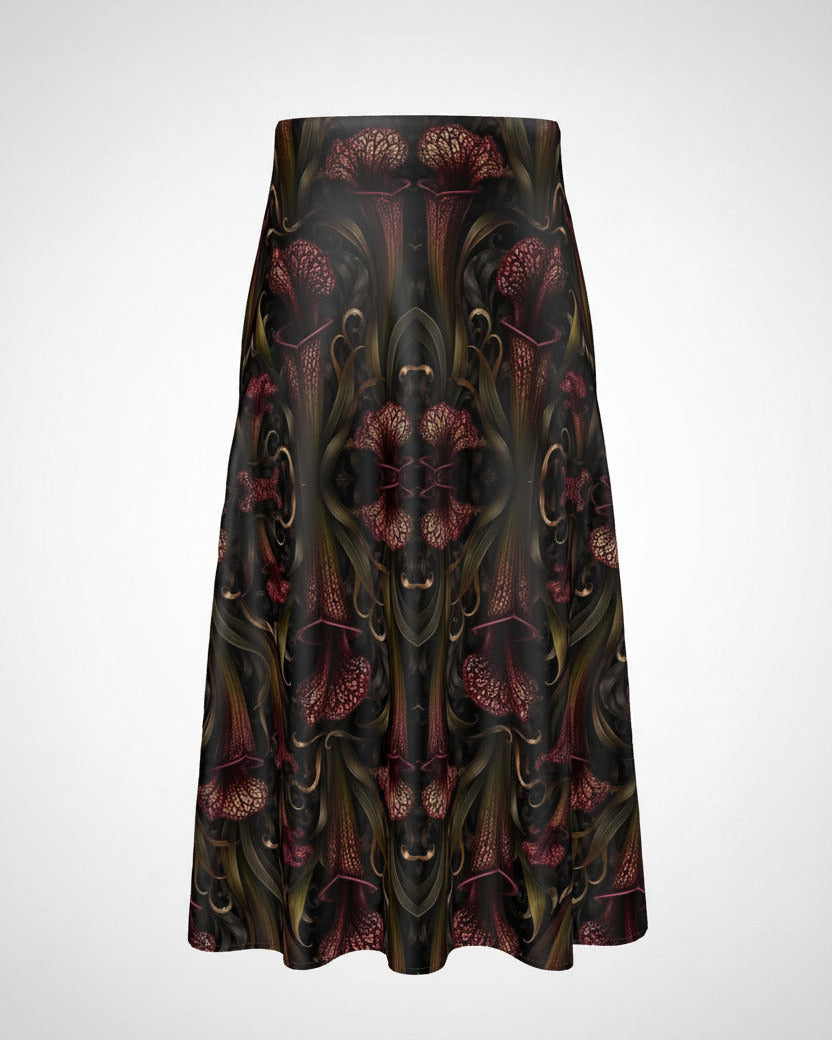 A high-waisted A-line midi skirt featuring a dark, symmetrical Art Deco style botanical pattern with burgundy, gold, and olive green details on a black base, shown against a plain white background.