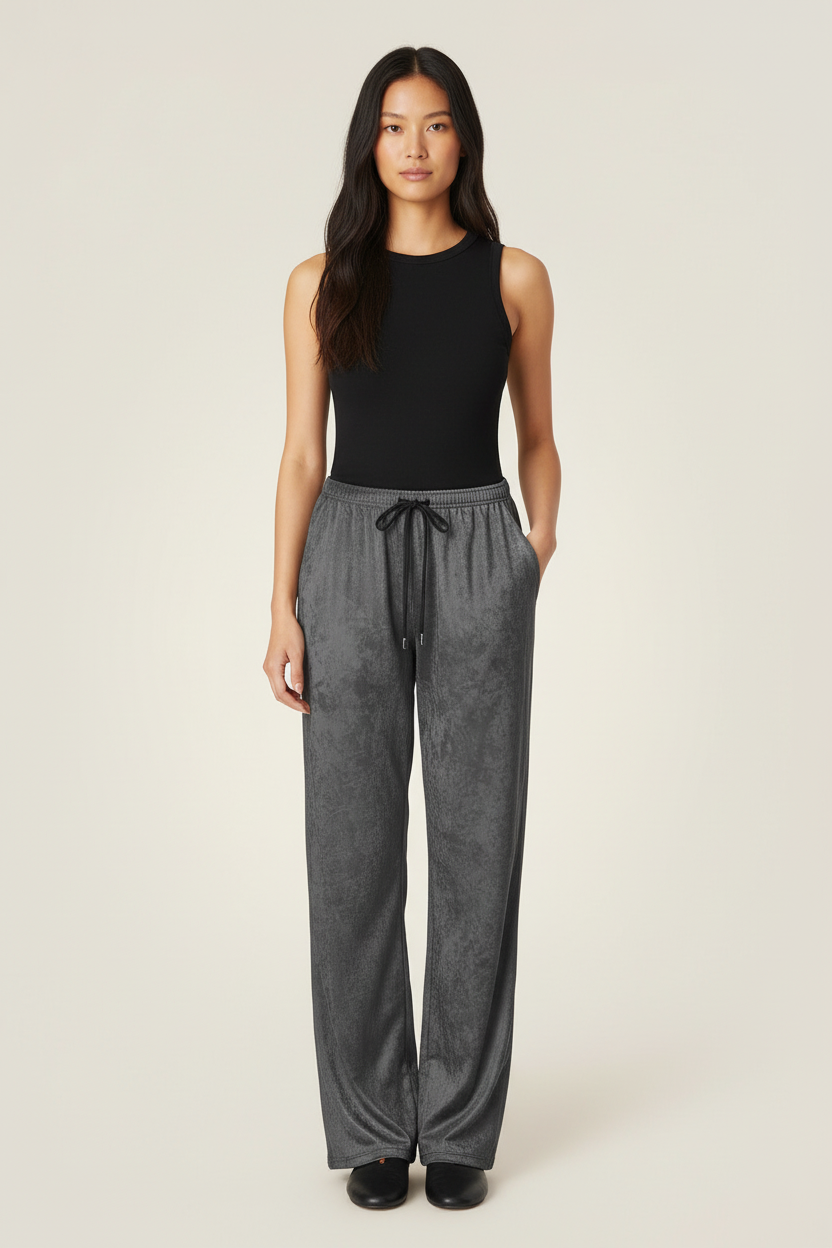 Front view of a model wearing NIMIAN Grey Diamond wide-leg trousers in crushed velour