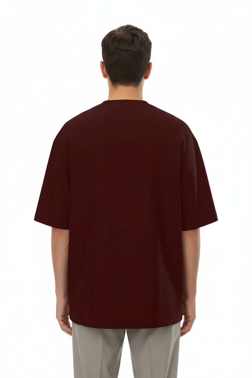 Back view of a model wearing the NIMIAN Rosa Mortis Oversized T-Shirt